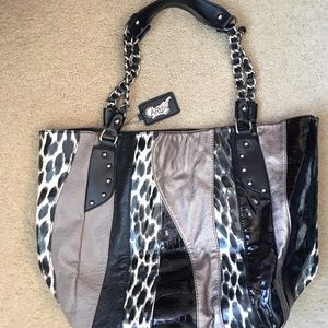 NEW - NEVER USED Carlos Santana bag from Macy’s